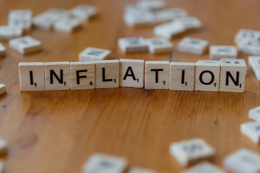 Inflation tiles on a table: Photo by Markus Winkler on Unsplash