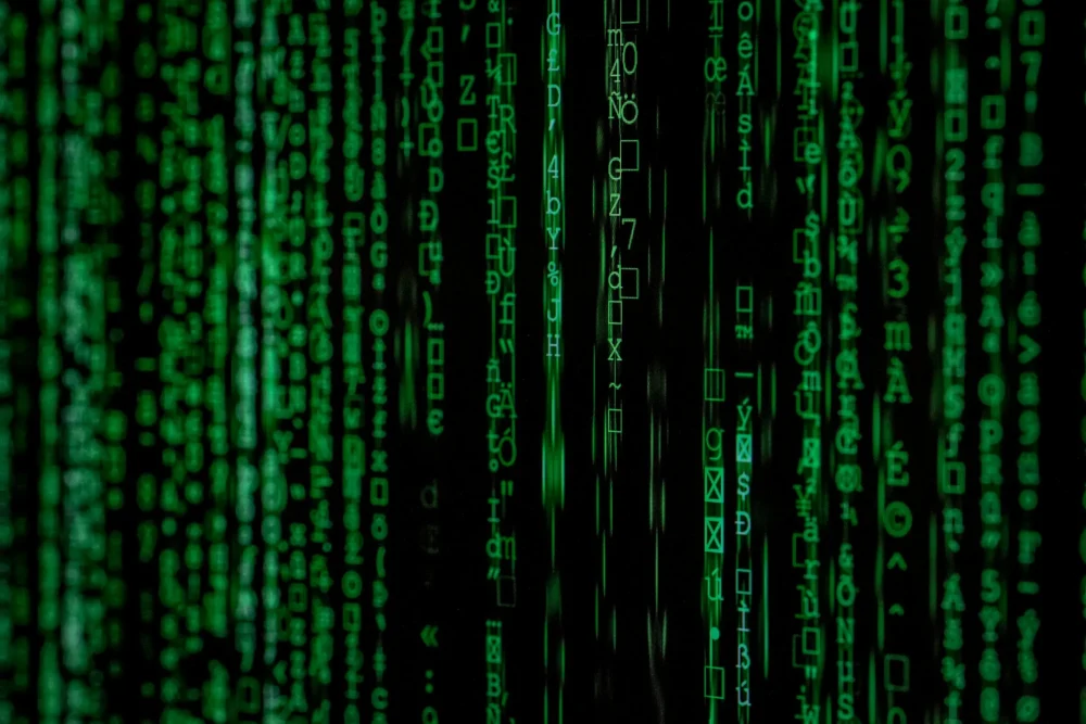 green hacking letter on a black screen: Photo by Markus Spiske on Unsplash