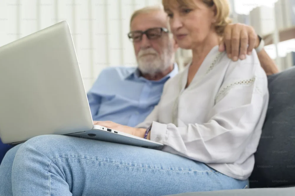 couple-looking-at-computer-getty-images-unsplash