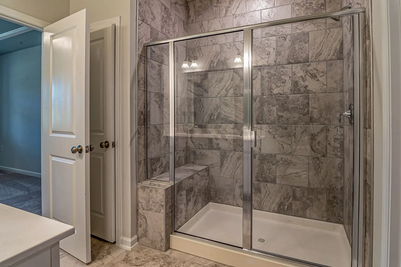 What Is the Best Material for a Walk-In Shower? (2026)